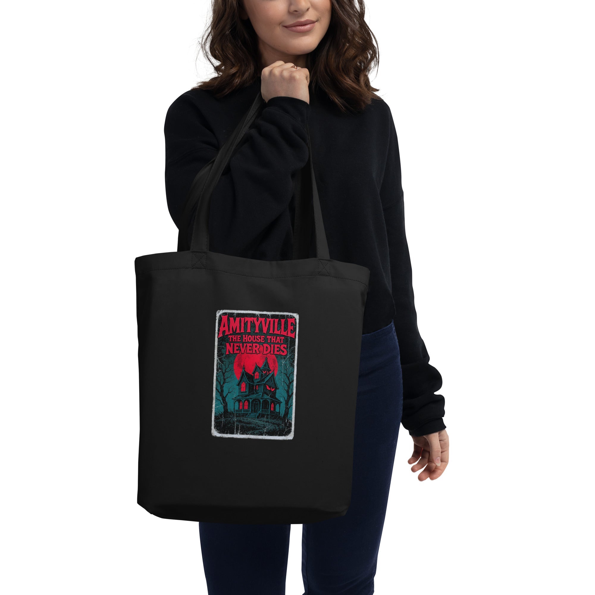 Collection of retro horror designs inspired by the haunted Amityville house, featuring vintage poster artwork and eerie taglines from Rare Plus Apparel, featuring a tote bag
