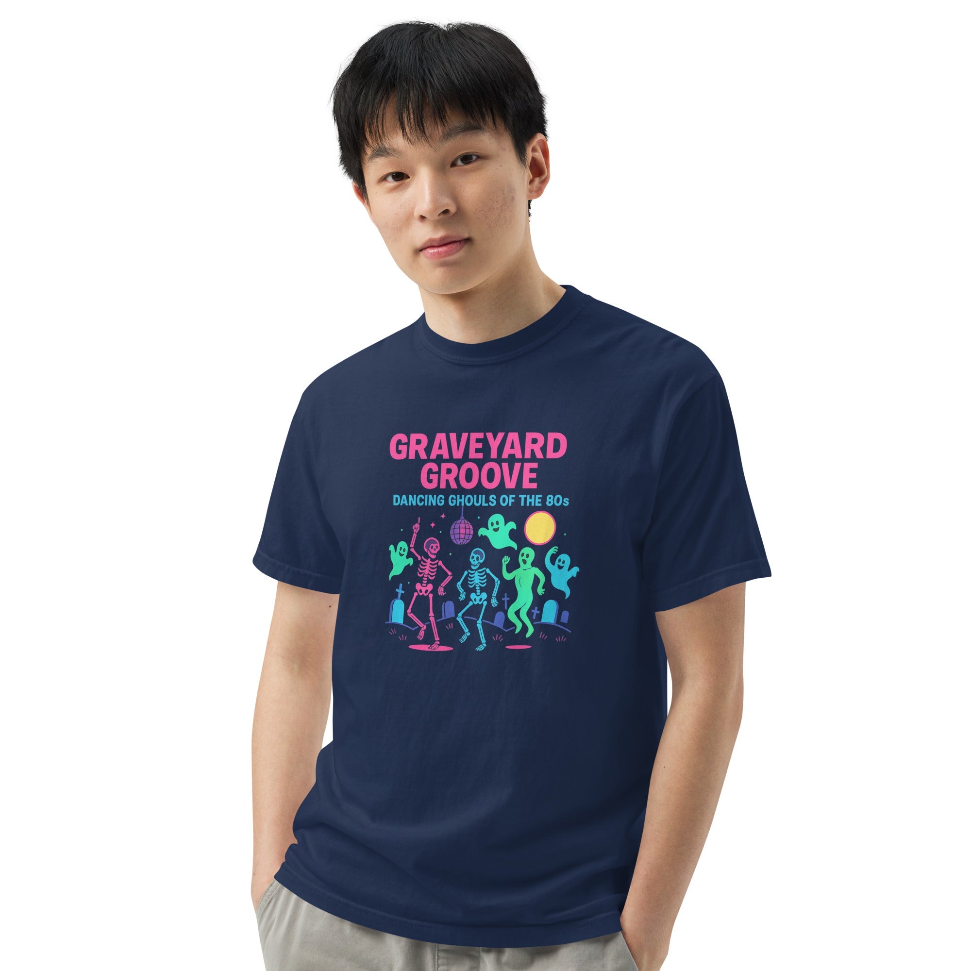 Model wearing a Graveyard Groove shirt with neon skeletons and ghosts dancing under a disco moon