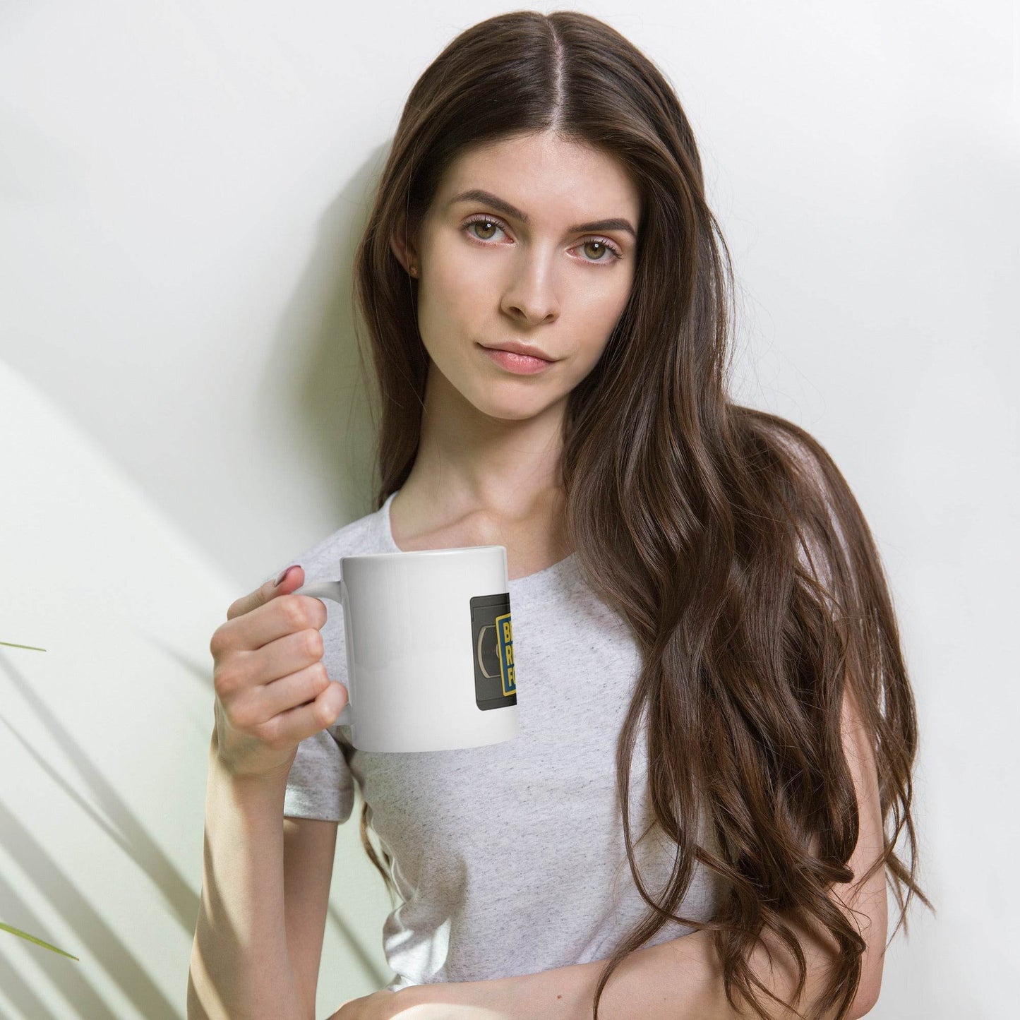 Be Kind, Rewind Forever White glossy mug from Rare Plus Apparel – unique movie & pop culture inspired design.