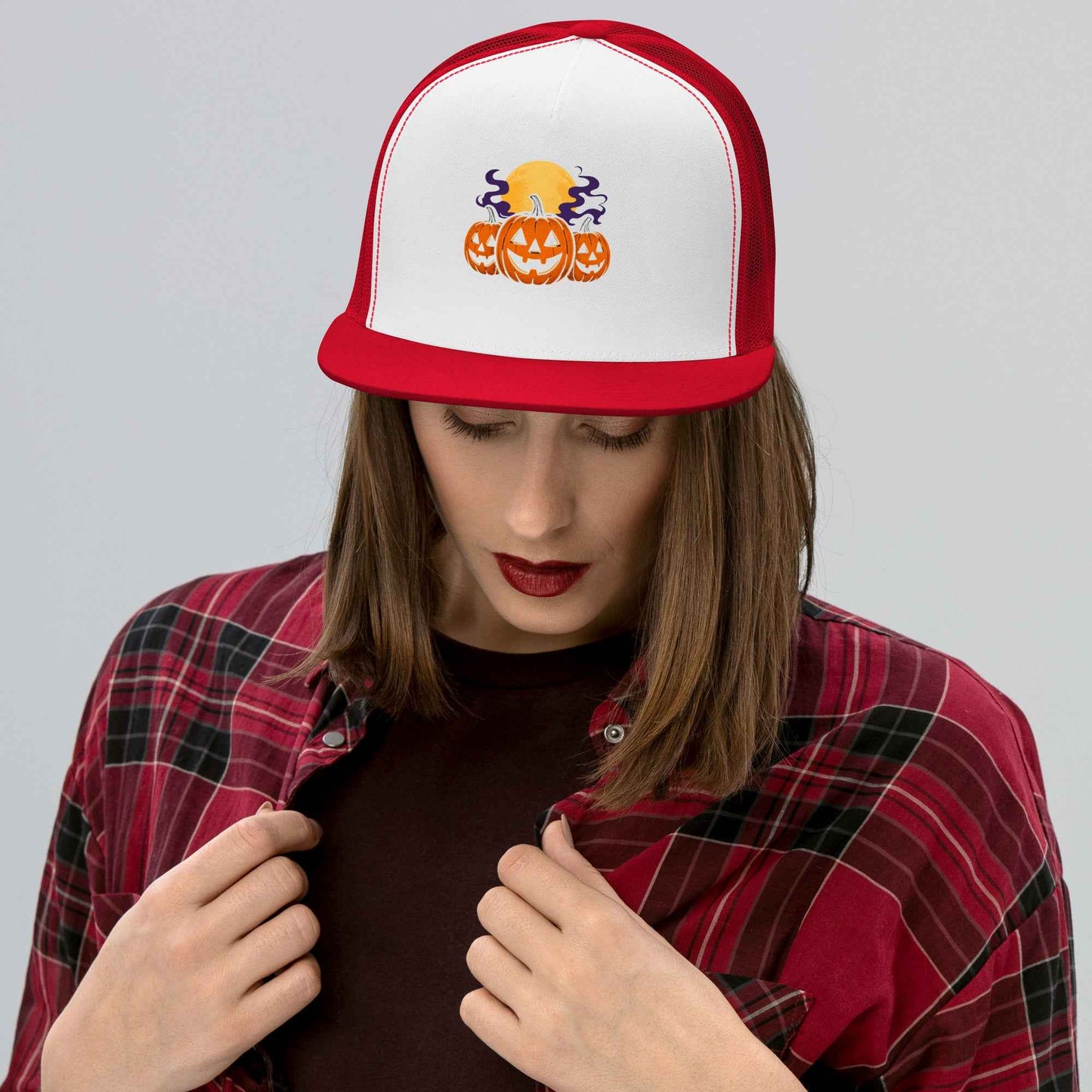 “Midnight Pumpkins” The Jack-O-Lantern Parade Trucker Cap