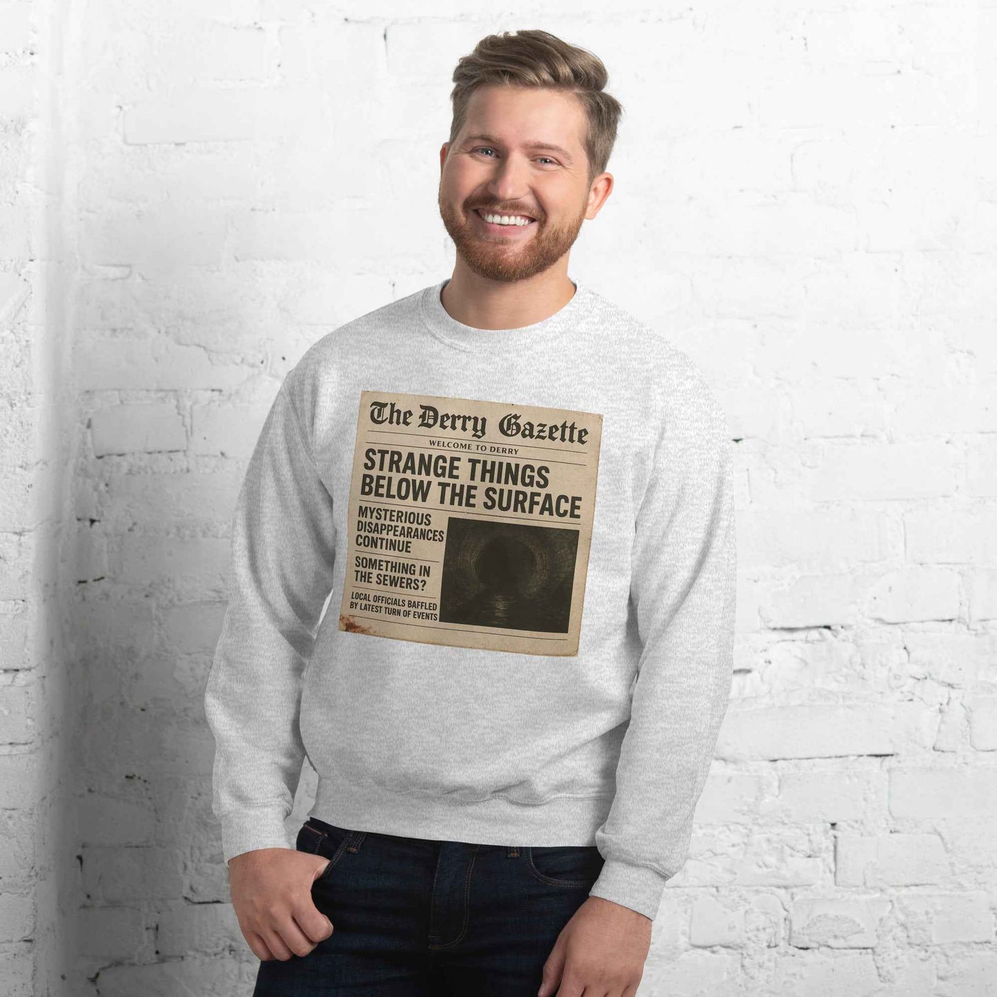The Derry Gazette “Strange Things Below the Surface” Unisex Sweatshirt