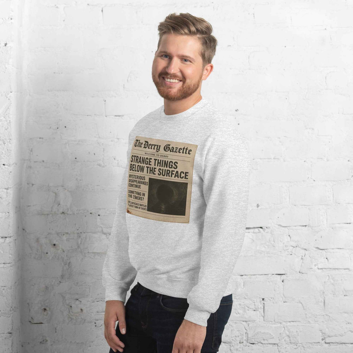 The Derry Gazette “Strange Things Below the Surface” Unisex Sweatshirt