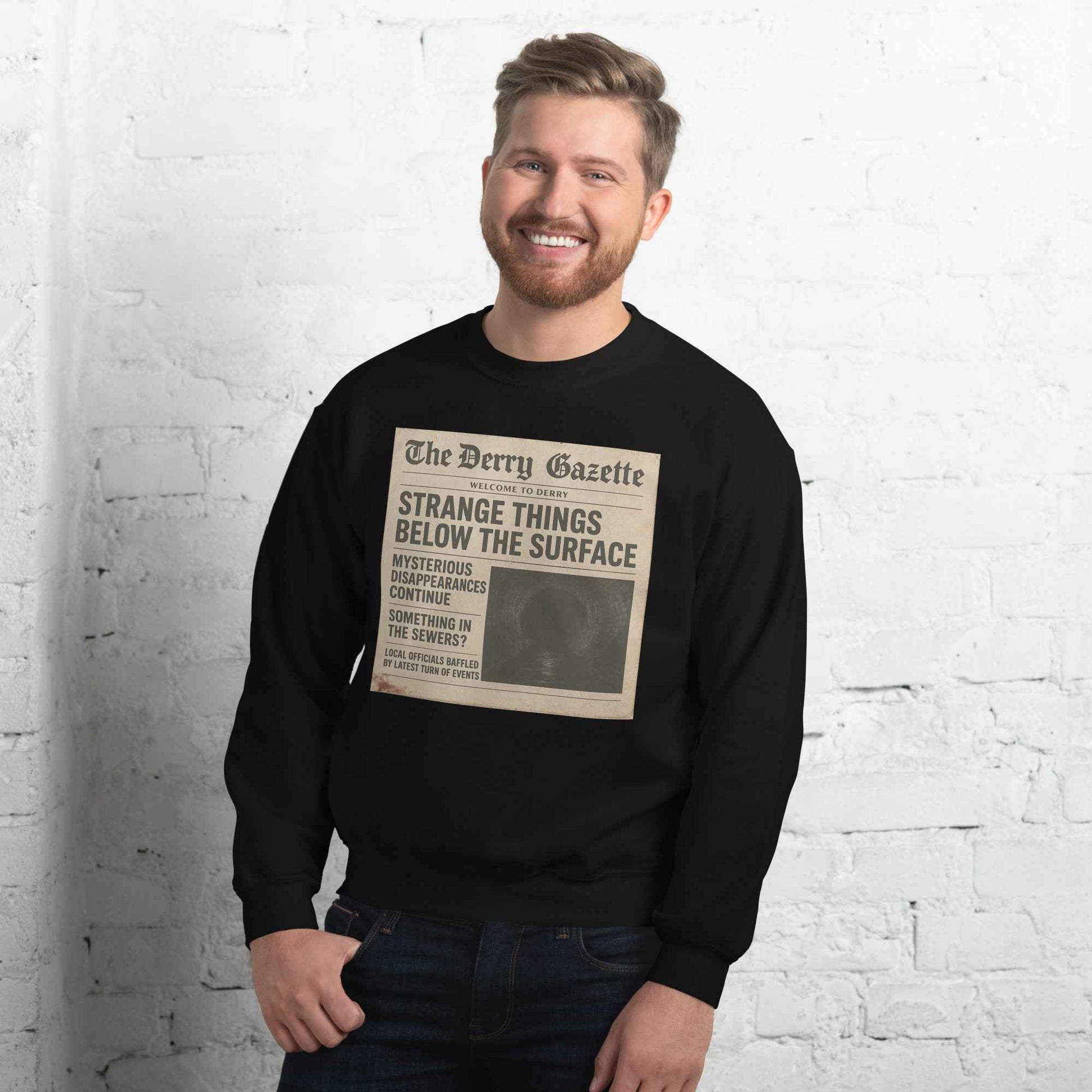 The Derry Gazette “Strange Things Below the Surface” Unisex Sweatshirt