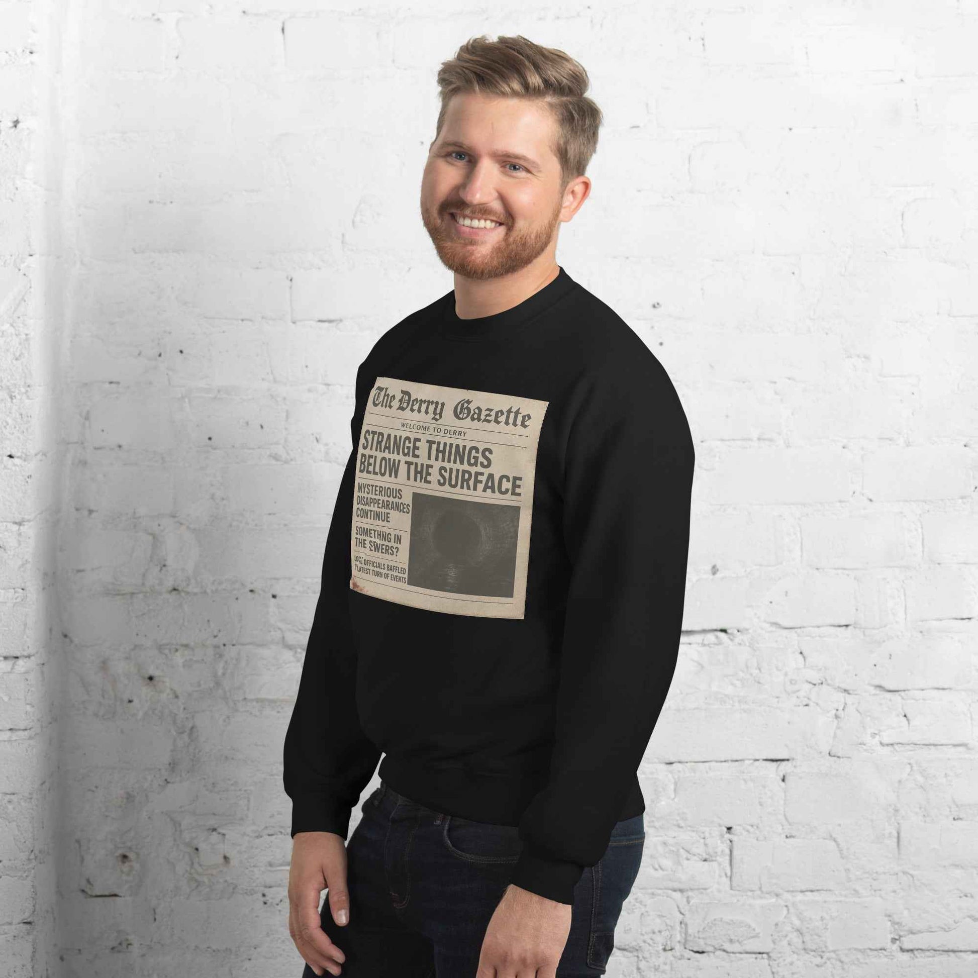The Derry Gazette “Strange Things Below the Surface” Unisex Sweatshirt