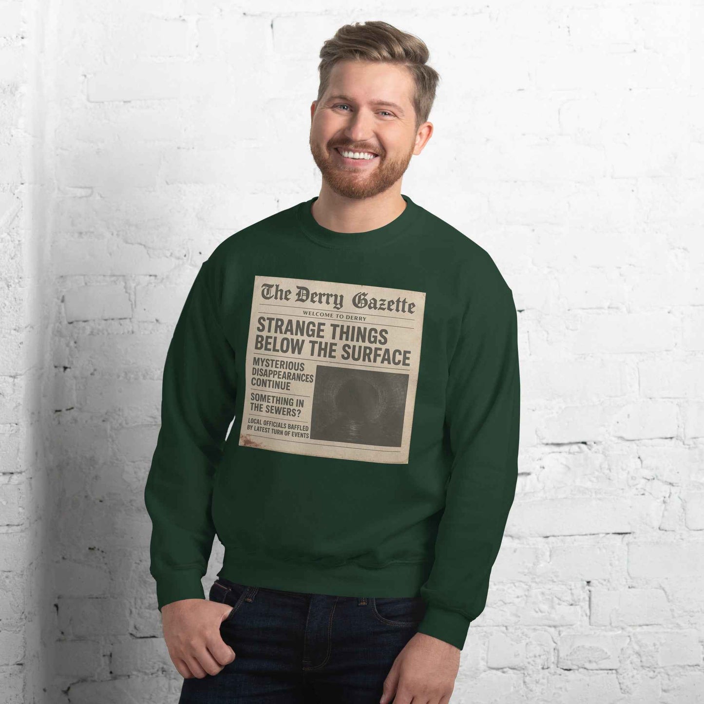 The Derry Gazette “Strange Things Below the Surface” Unisex Sweatshirt