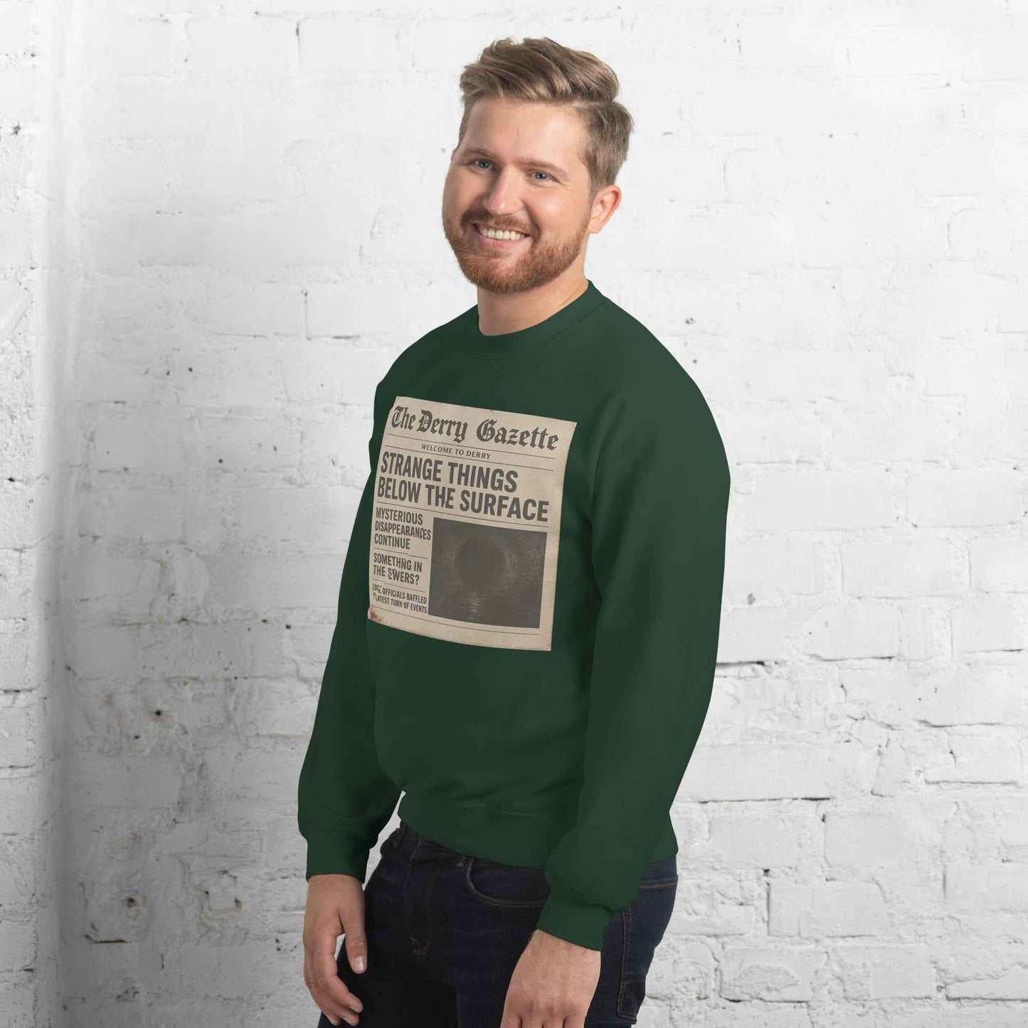 The Derry Gazette “Strange Things Below the Surface” Unisex Sweatshirt