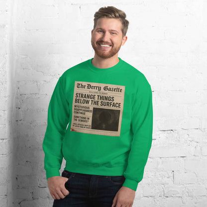 The Derry Gazette “Strange Things Below the Surface” Unisex Sweatshirt