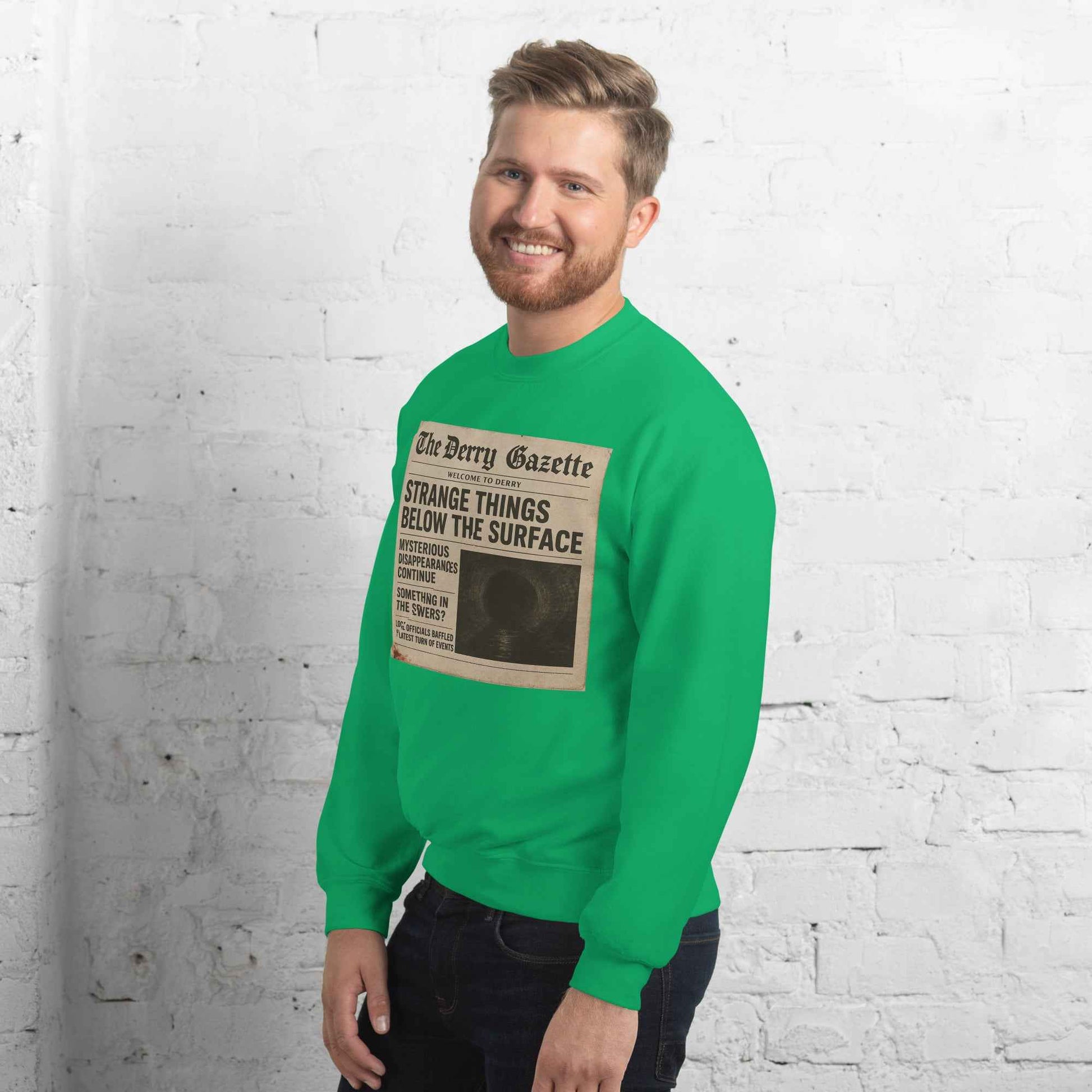 The Derry Gazette “Strange Things Below the Surface” Unisex Sweatshirt
