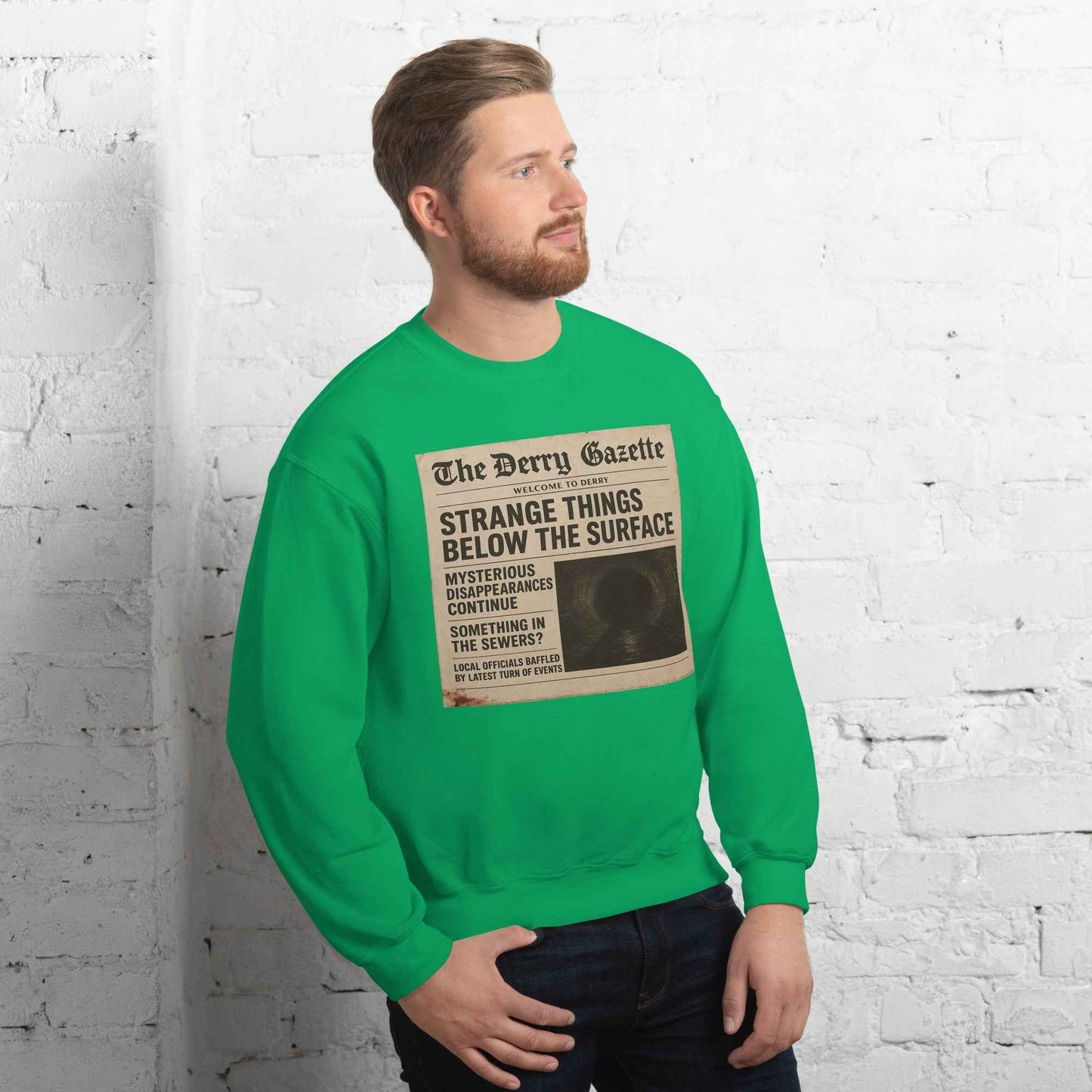 The Derry Gazette “Strange Things Below the Surface” Unisex Sweatshirt