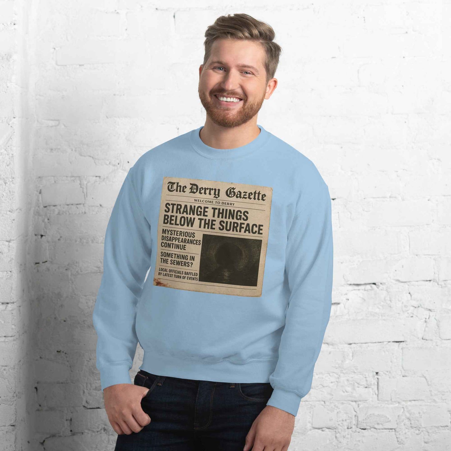 The Derry Gazette “Strange Things Below the Surface” Unisex Sweatshirt