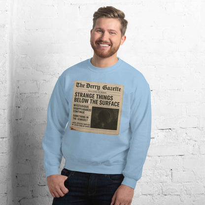 The Derry Gazette “Strange Things Below the Surface” Unisex Sweatshirt