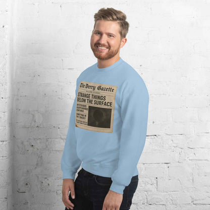 The Derry Gazette “Strange Things Below the Surface” Unisex Sweatshirt