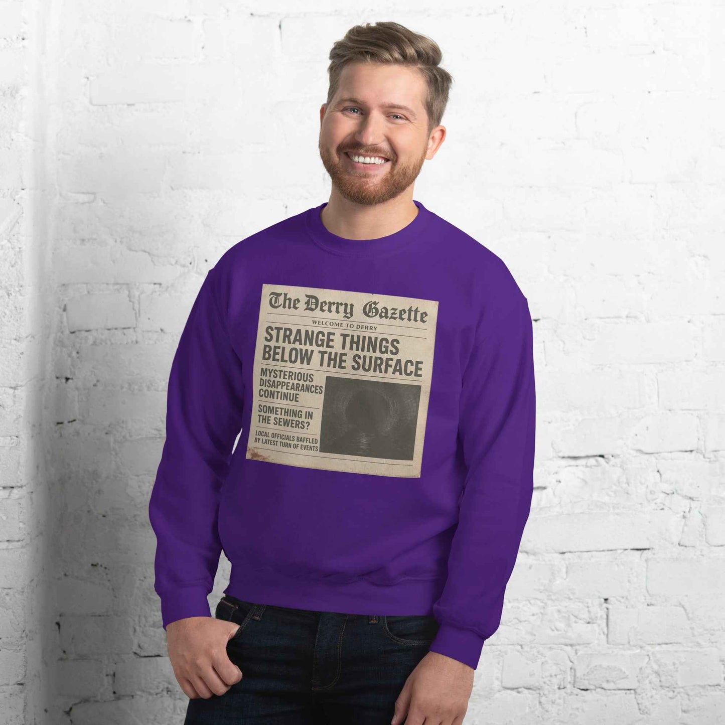 The Derry Gazette “Strange Things Below the Surface” Unisex Sweatshirt