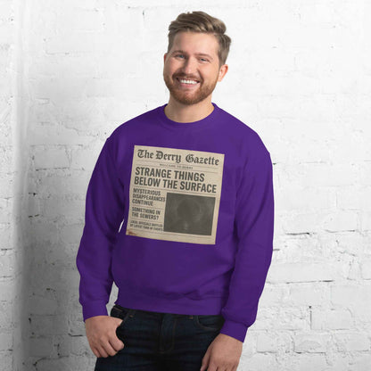 The Derry Gazette “Strange Things Below the Surface” Unisex Sweatshirt