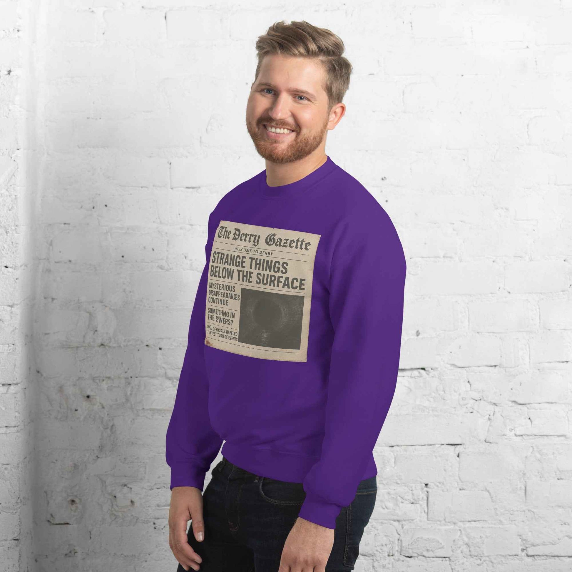 The Derry Gazette “Strange Things Below the Surface” Unisex Sweatshirt