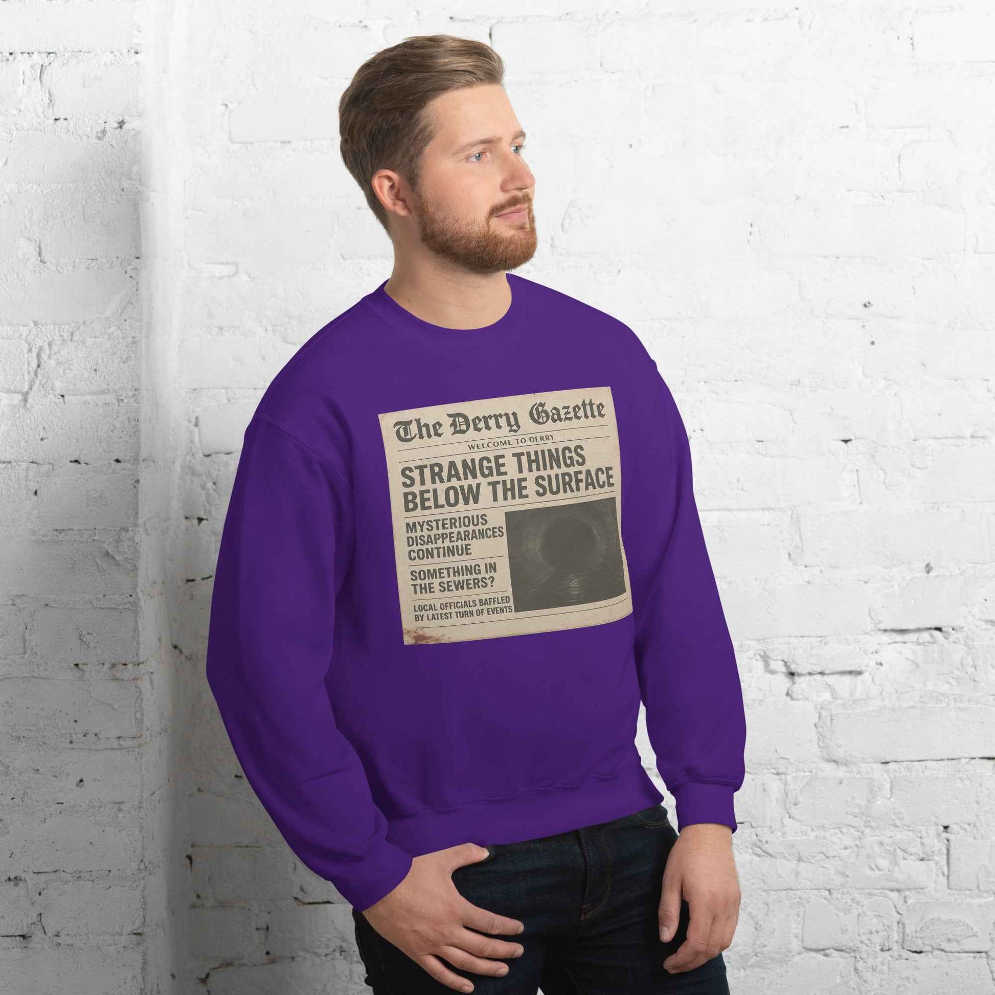 The Derry Gazette “Strange Things Below the Surface” Unisex Sweatshirt