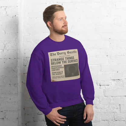 The Derry Gazette “Strange Things Below the Surface” Unisex Sweatshirt
