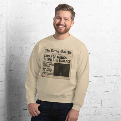 The Derry Gazette “Strange Things Below the Surface” Unisex Sweatshirt