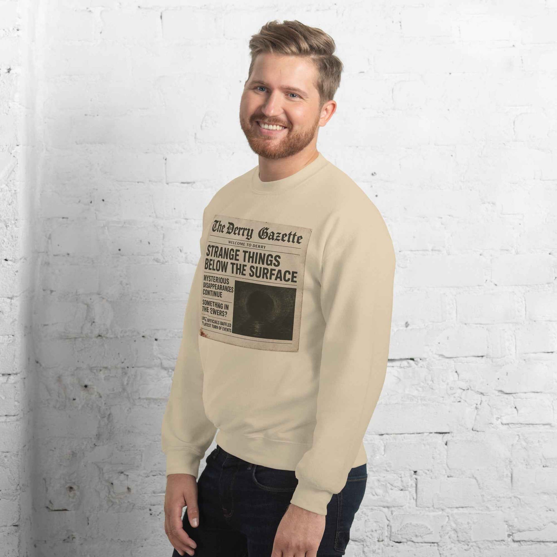 The Derry Gazette “Strange Things Below the Surface” Unisex Sweatshirt