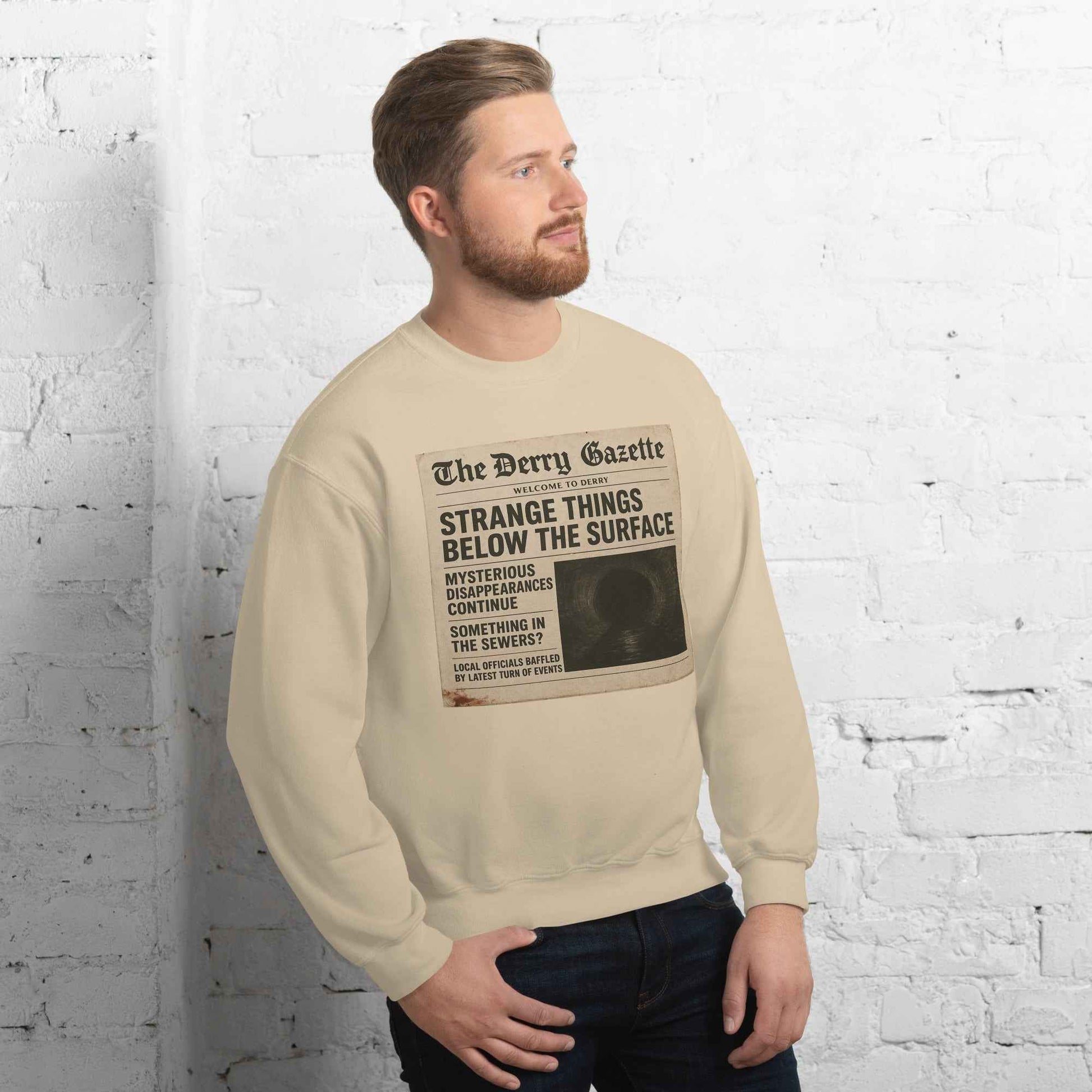 The Derry Gazette “Strange Things Below the Surface” Unisex Sweatshirt