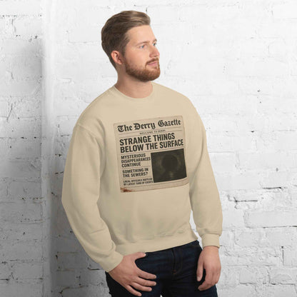 The Derry Gazette “Strange Things Below the Surface” Unisex Sweatshirt