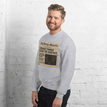 The Derry Gazette “Strange Things Below the Surface” Unisex Sweatshirt
