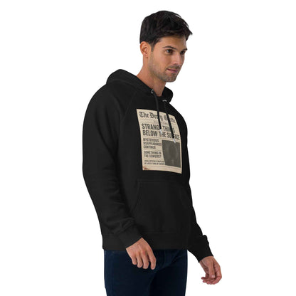 The Derry Gazette “Strange Things Below the Surface” Unisex eco raglan hoodie