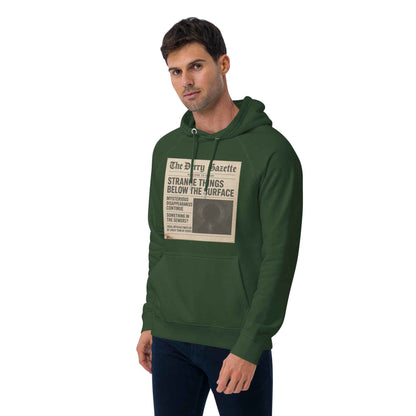 The Derry Gazette “Strange Things Below the Surface” Unisex eco raglan hoodie