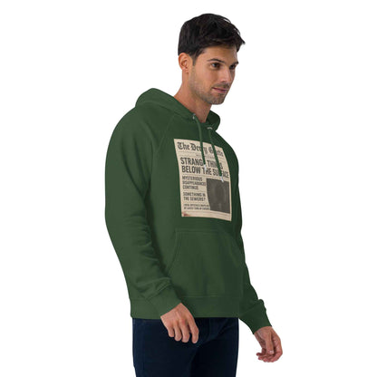 The Derry Gazette “Strange Things Below the Surface” Unisex eco raglan hoodie