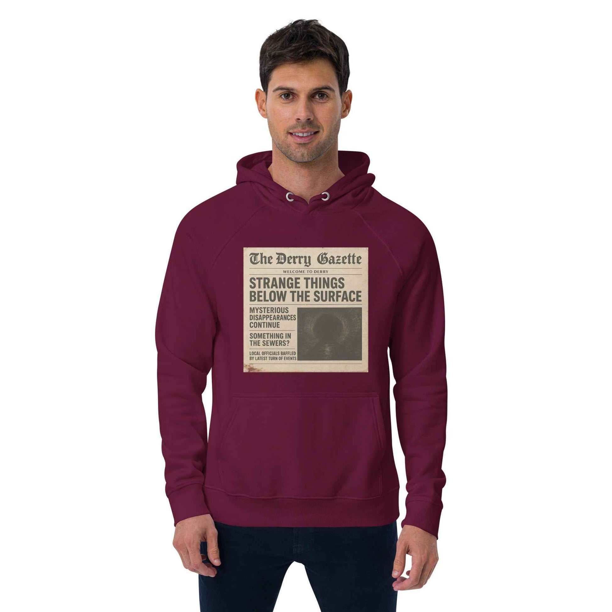 The Derry Gazette “Strange Things Below the Surface” Unisex eco raglan hoodie