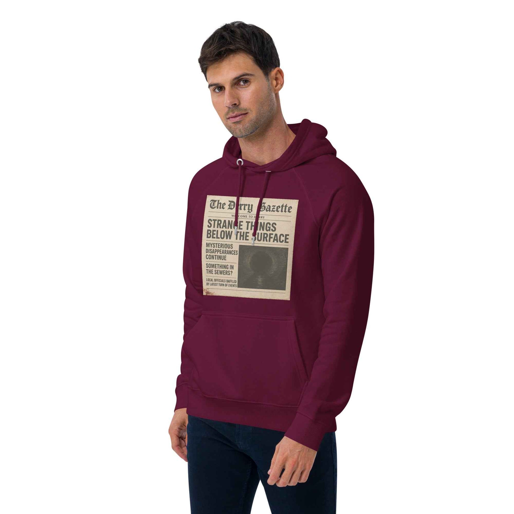 The Derry Gazette “Strange Things Below the Surface” Unisex eco raglan hoodie